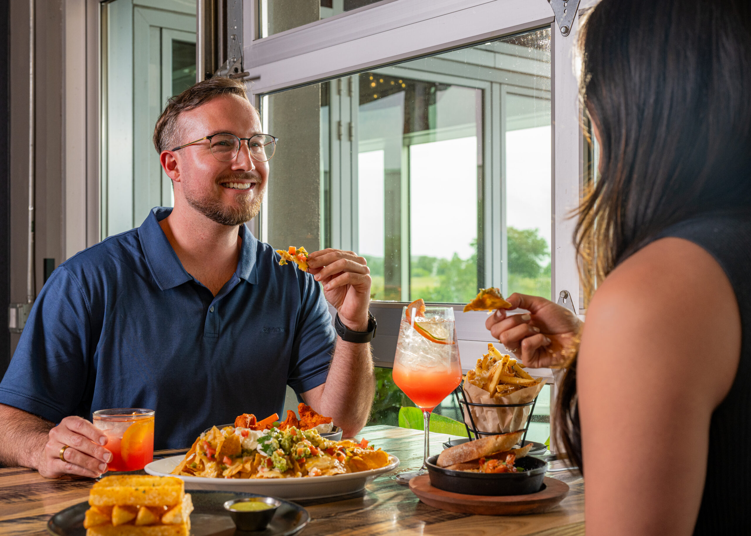 people eating and drinking